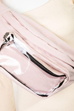 a close up of a pink purse on a mannequin