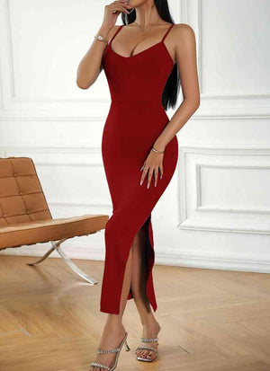 a woman in a red dress posing for a picture