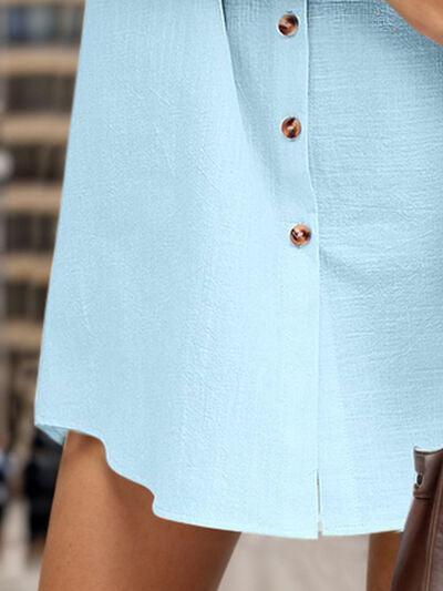 a woman in a blue skirt holding a brown purse