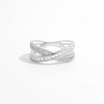 a white gold and diamond ring on a white background