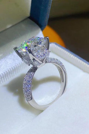 a close up of a diamond ring in a box