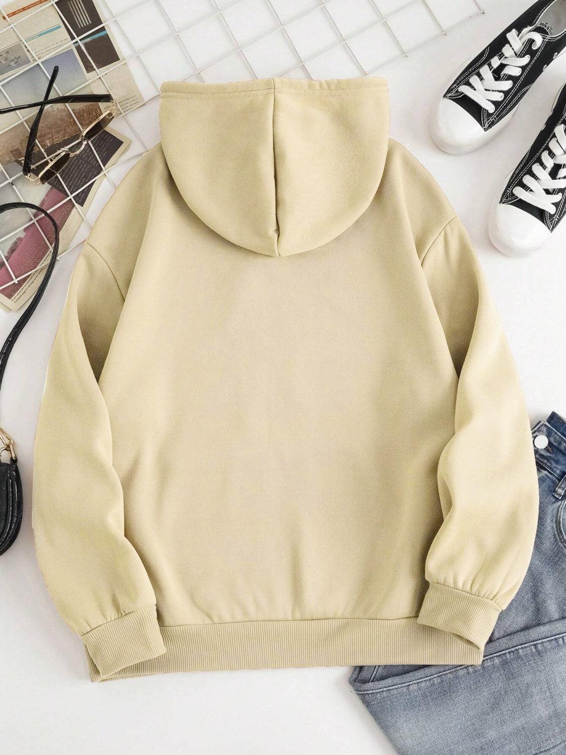 a women's hoodie with a pair of sneakers