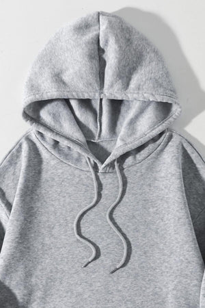 a gray sweatshirt with a hoodie on it