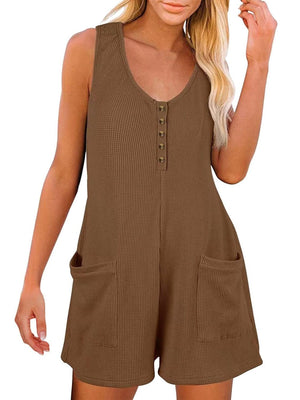 a woman wearing a brown rom with buttons