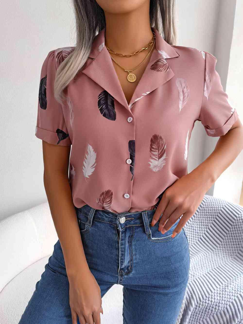 a woman wearing a pink shirt and jeans