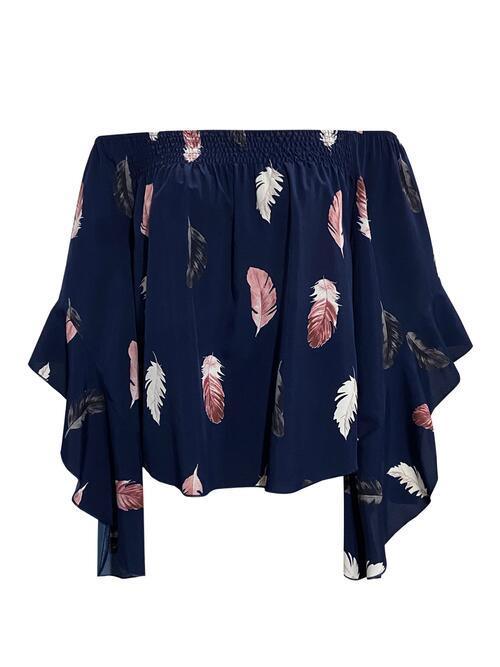 a top with feathers on it