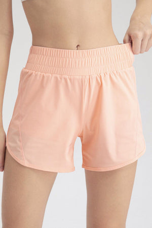 a close up of a person wearing a pair of shorts