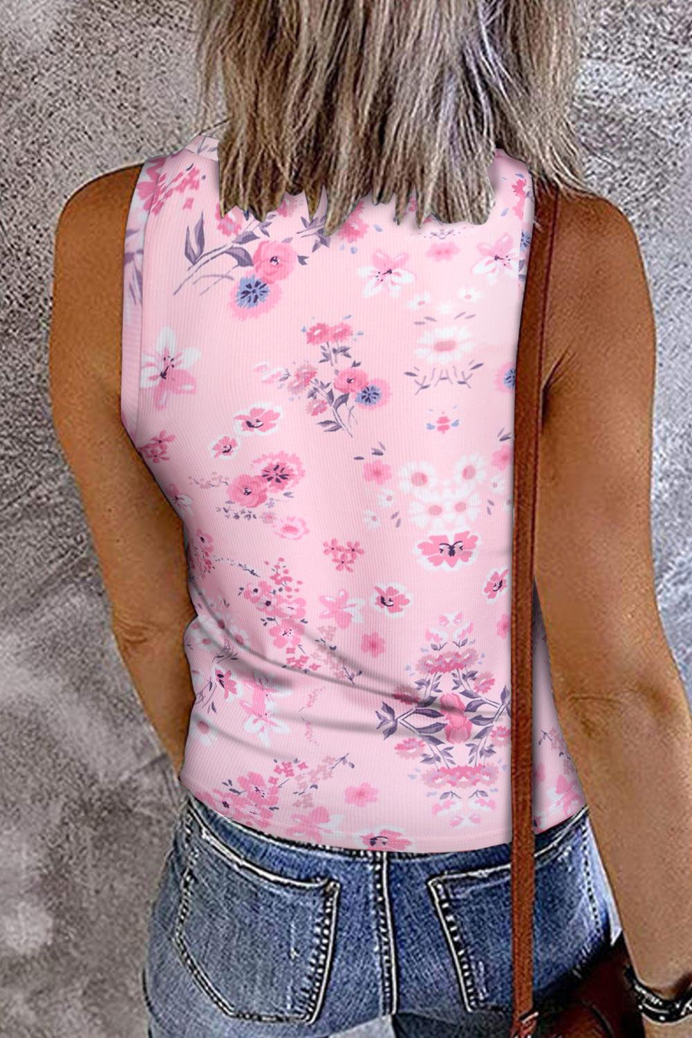 a woman wearing a pink shirt and jeans