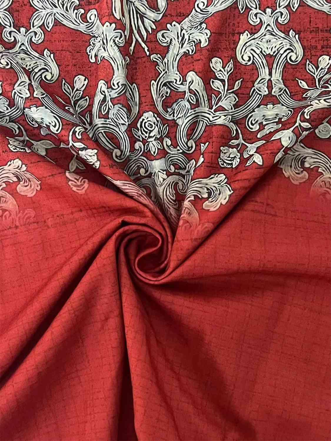 a close up of a red and white fabric