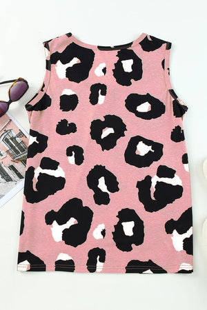 a pink tank top with black and white animal print