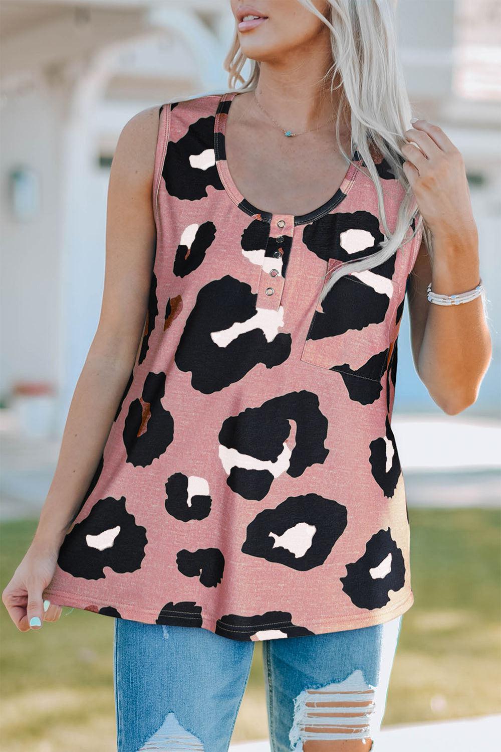 a woman wearing a pink top with black and white animal print