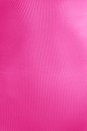 a close up of a bright pink background