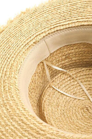 a close up of a straw hat on a white background