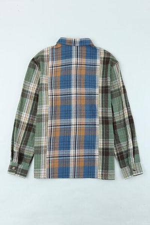 a green and blue plaid shirt on a white background