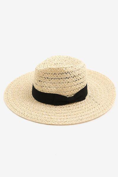 a straw hat with a black ribbon around the brim