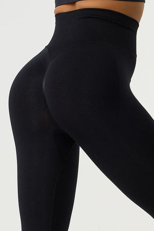 a close up of a woman's legs in black tights
