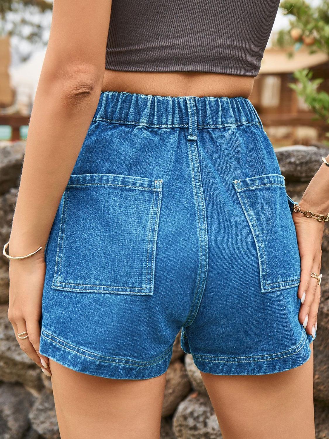 a close up of a person wearing shorts