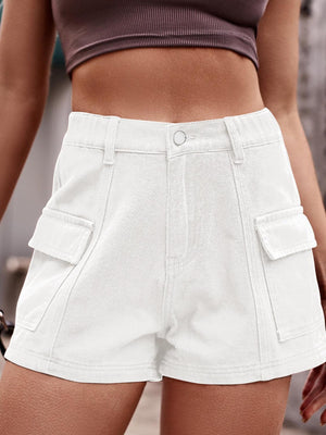 a close up of a person wearing white shorts