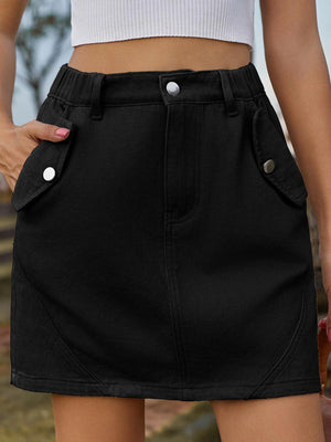 a close up of a person wearing a black skirt