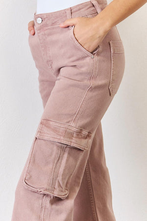 a woman is wearing a pair of pink pants