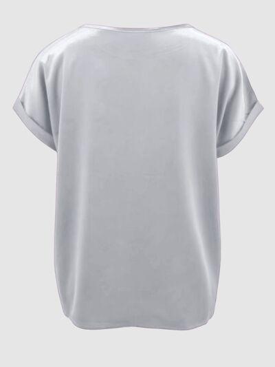 a women's white top with short sleeves