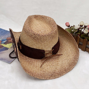 a straw hat sitting on top of a white table