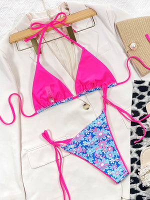 a pink and blue bikini top and a pair of shoes