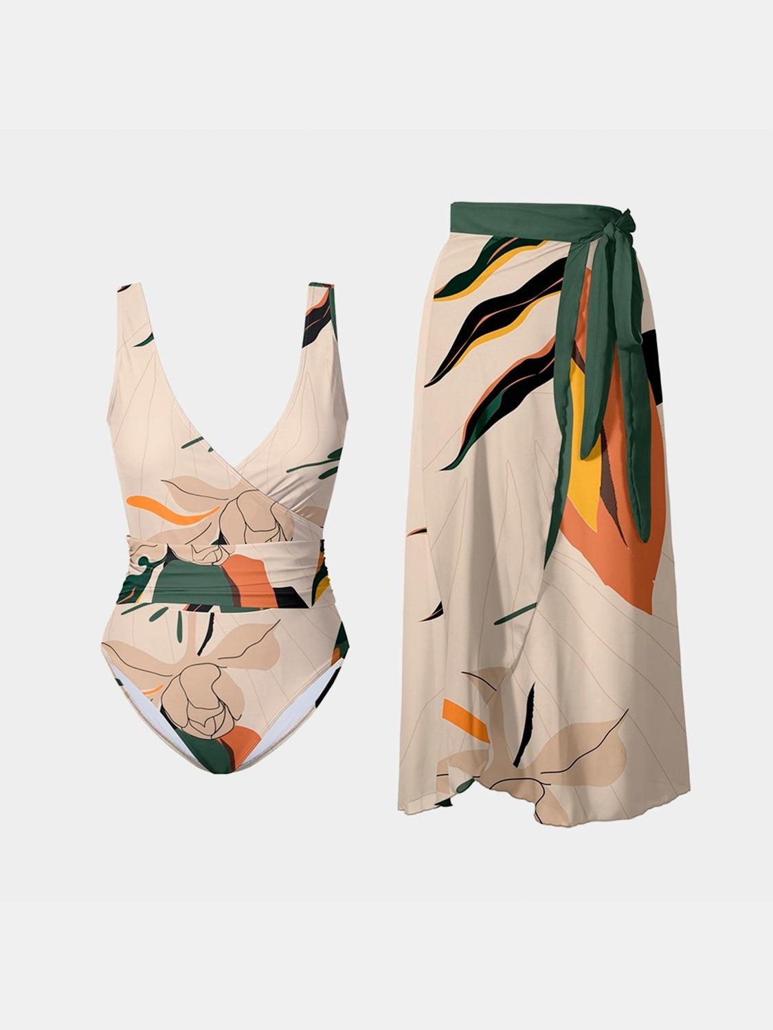 a women's swimsuit with a tropical print