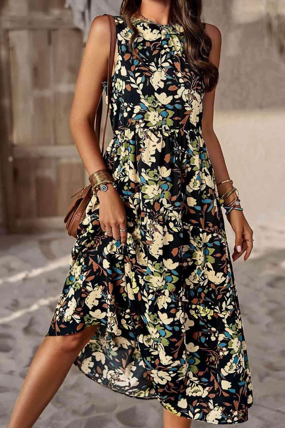 a woman in a black and white floral print dress