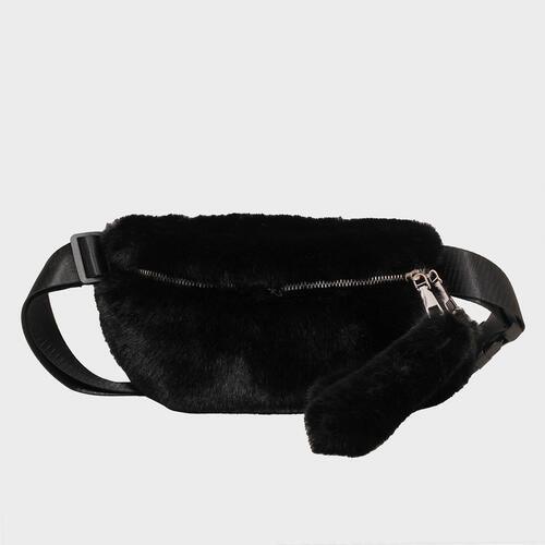 a black furry bag with a zipper on it