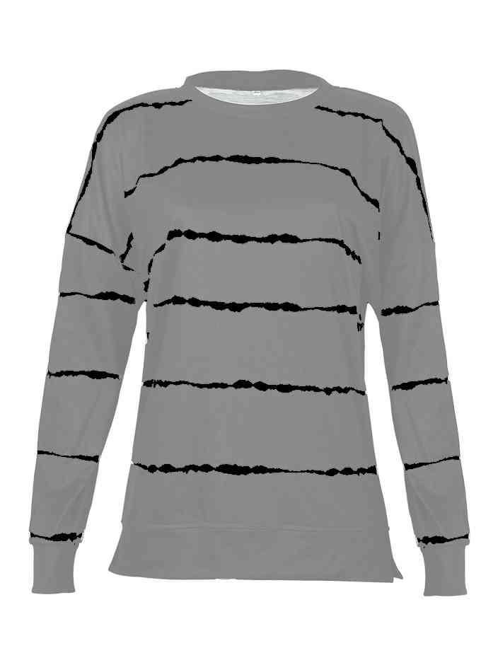 a women's sweater with black and white stripes