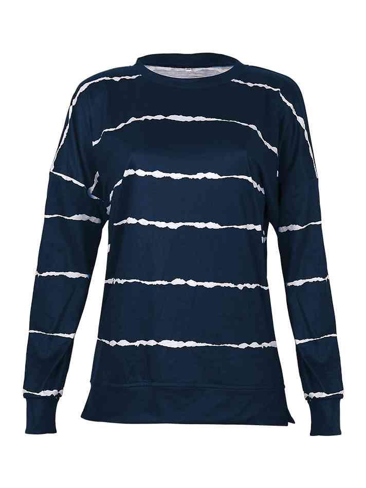 a women's navy sweater with white stripes