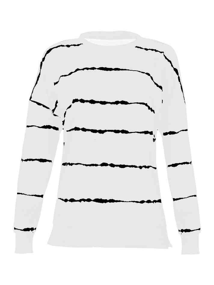 a white shirt with black stripes on it