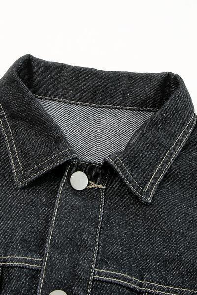a close up of a black jean jacket