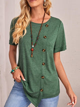 a woman wearing a green top with buttons