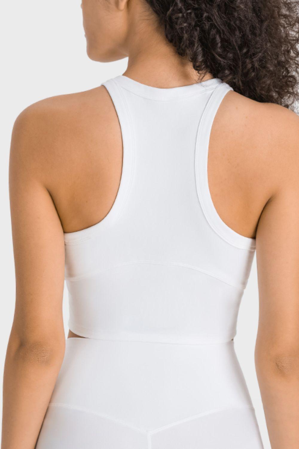 the back of a woman wearing a white bodysuit