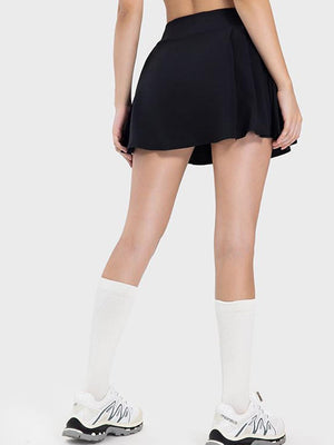 a woman in a black skirt and white socks