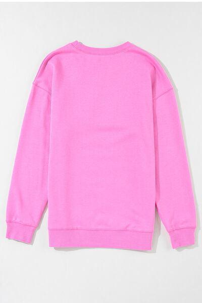 a pink sweatshirt with a white background