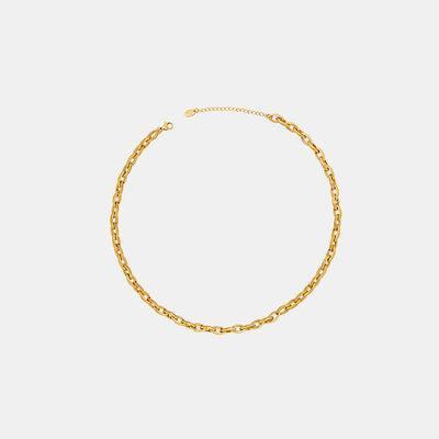 a gold chain bracelet on a white background