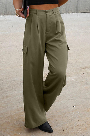 a woman in a black top and khaki pants