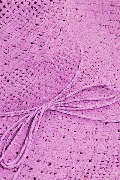 a close up of a pink knitted blanket