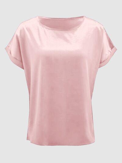 a women's pink top with short sleeves