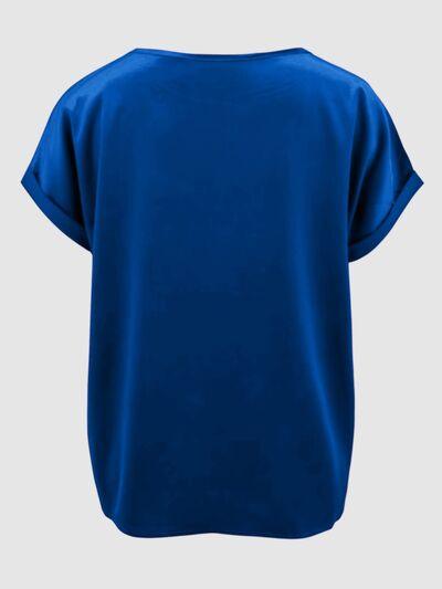 a women's blue top with short sleeves