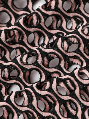 a close up of a black and pink fabric