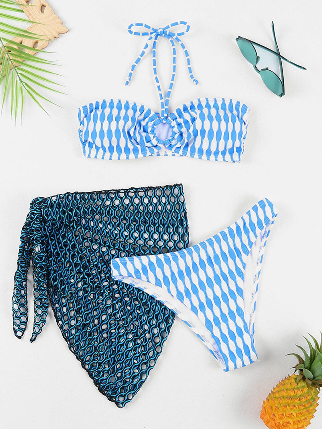 a blue and white bikini and a pineapple and sunglasses