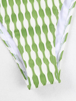 a close up of a green and white underwear