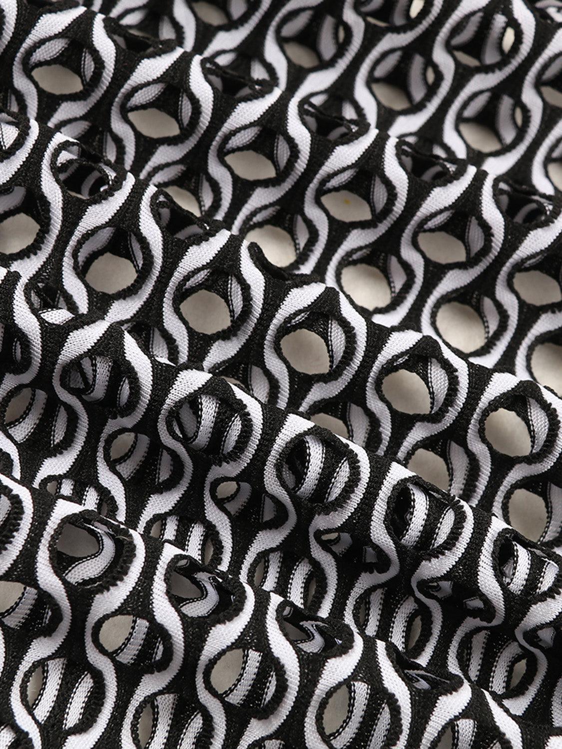 a close up of a black and white fabric