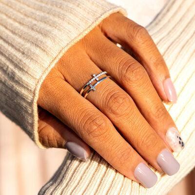 a woman's hand with a ring on it