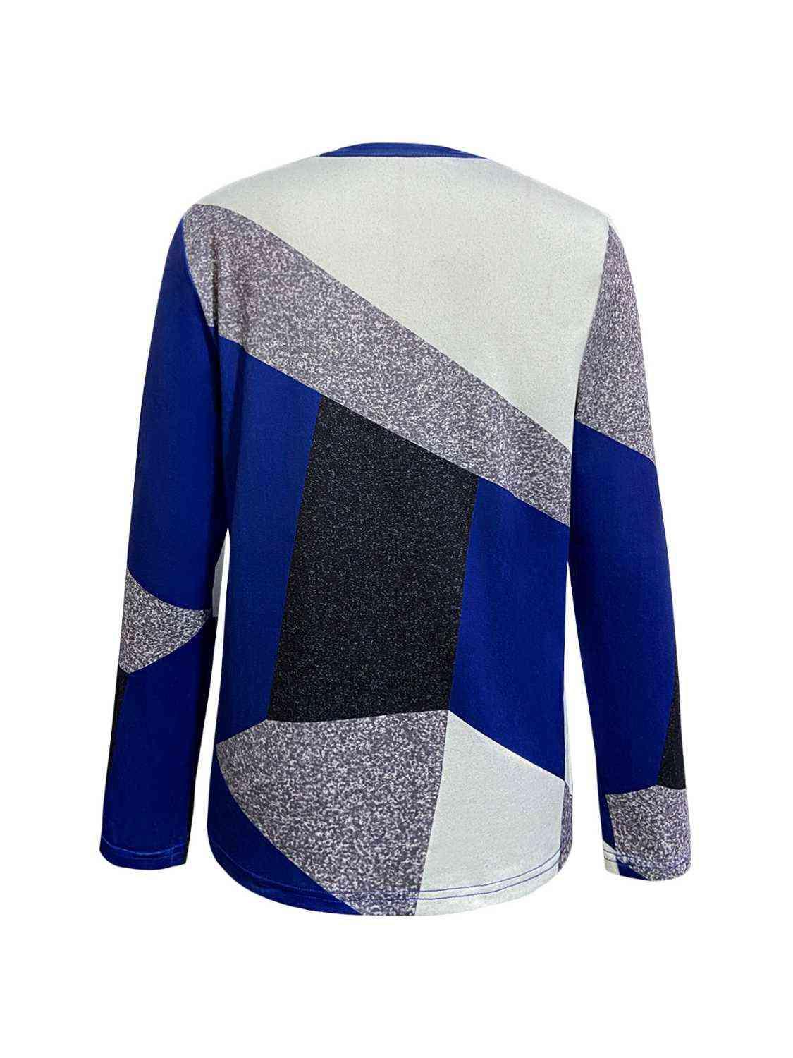 the back of a blue and white sweater