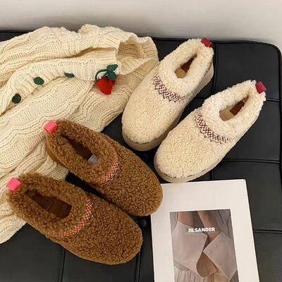 a picture of a pair of slippers and a sweater